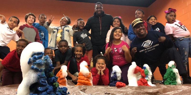 A group of students and teachers from the Boys & Girls Club of Oakland posing for a picture.