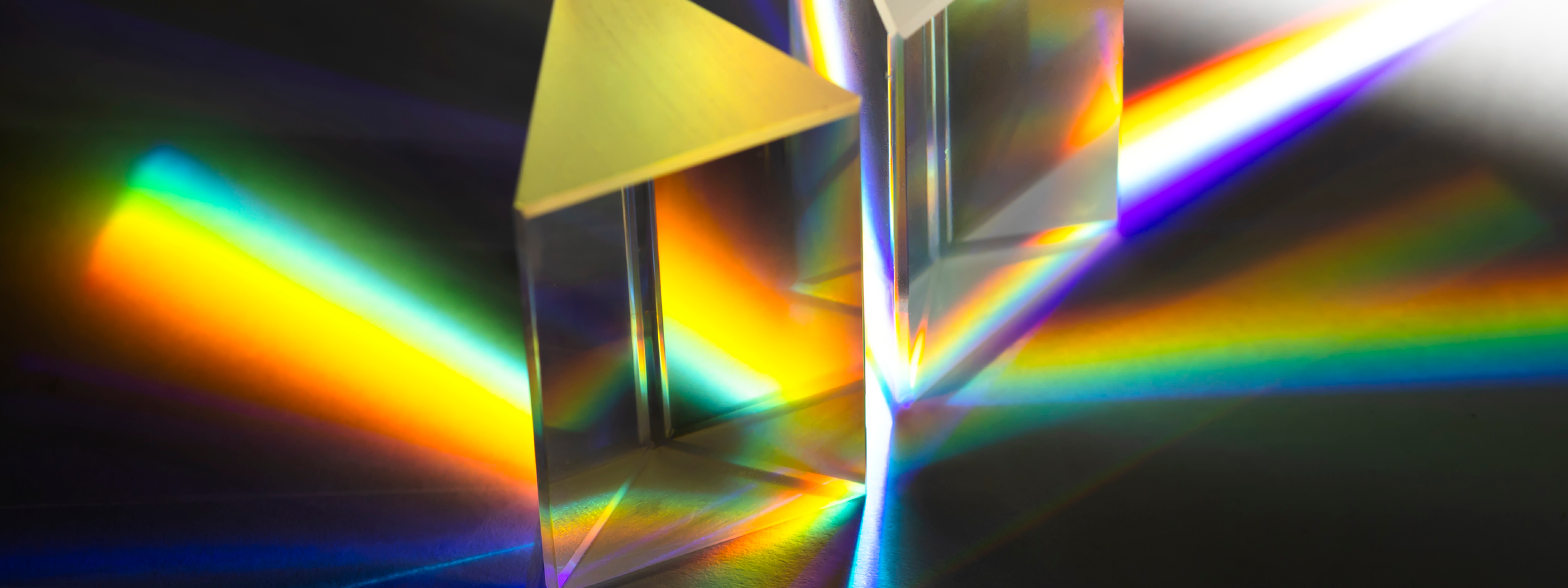 Triangular prisms reflecting color.